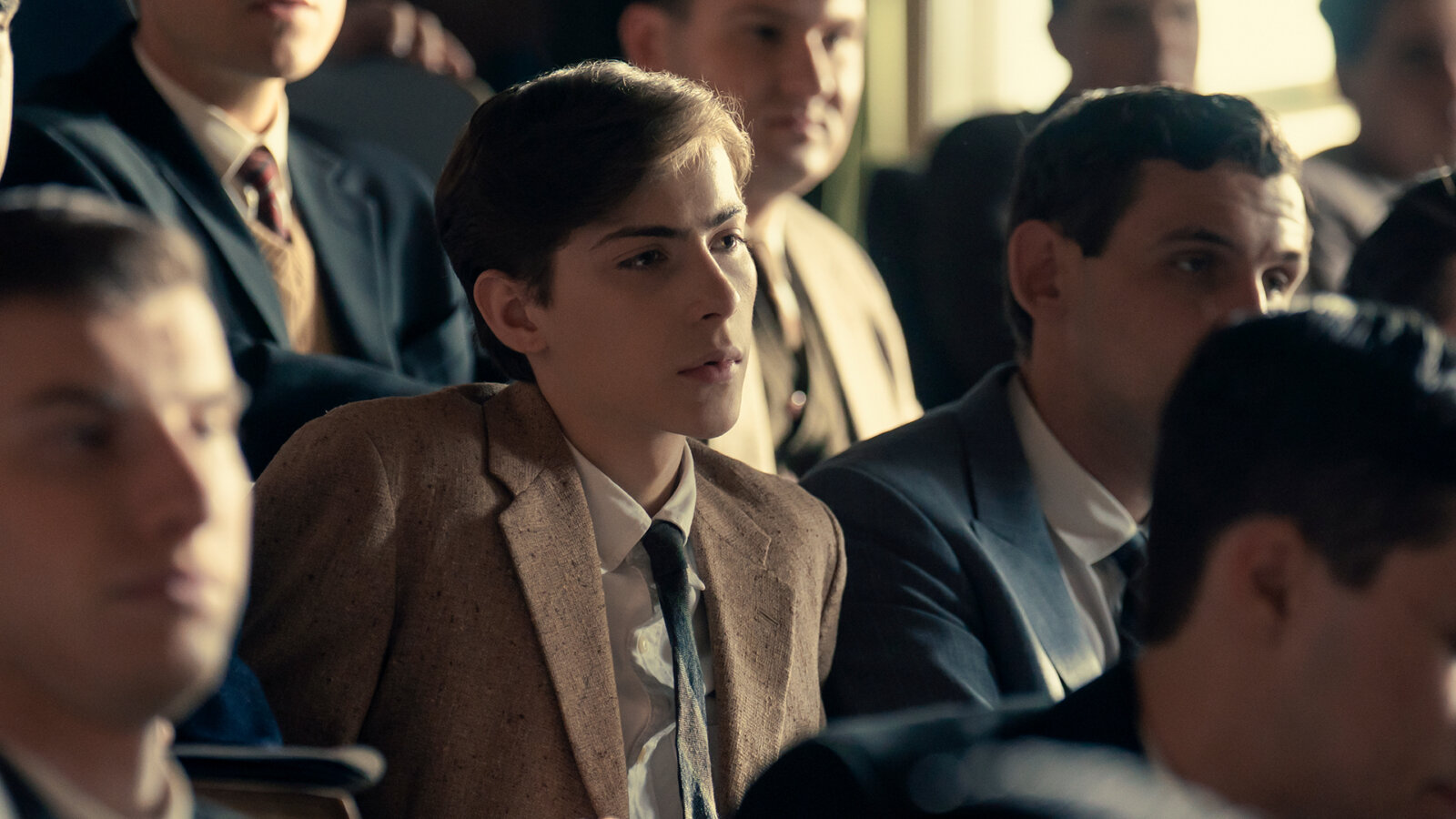 Ted listening intently in class in Unabomber.