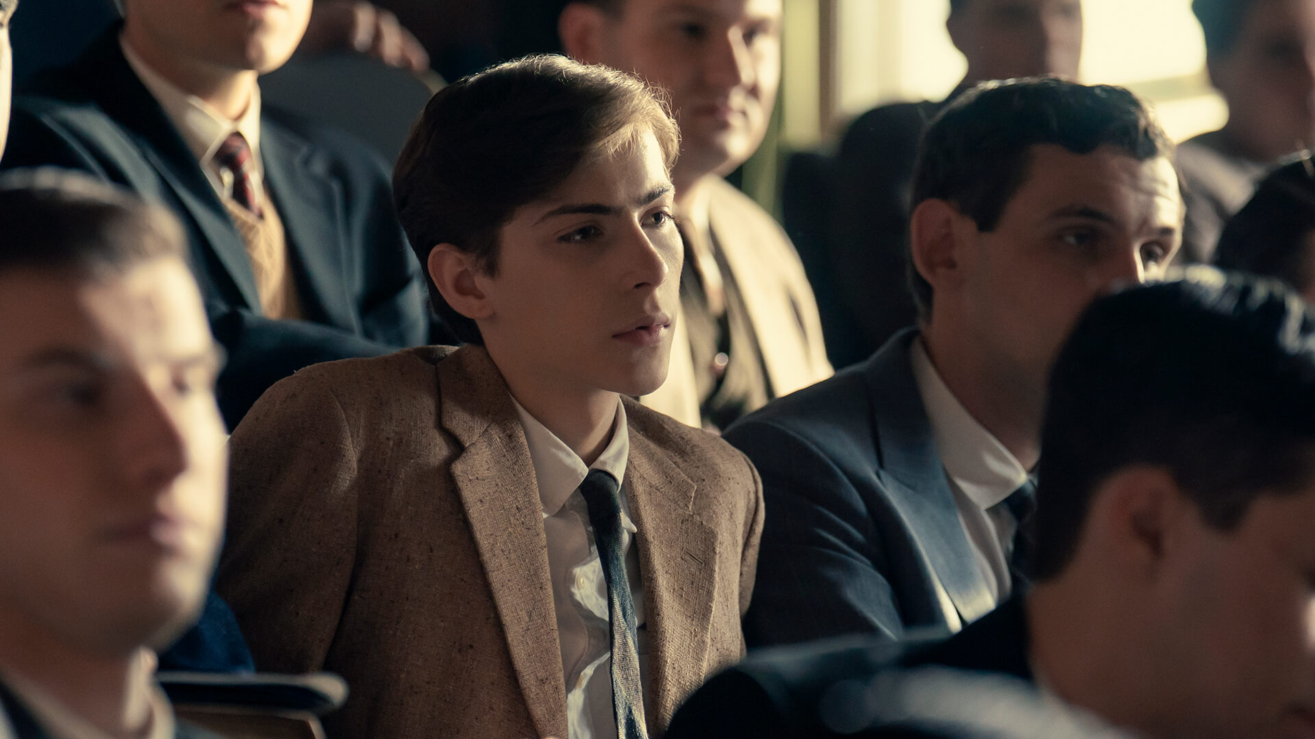Ted listening intently in class in Unabomber.