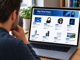 A man shopping on a tech site on his laptop.